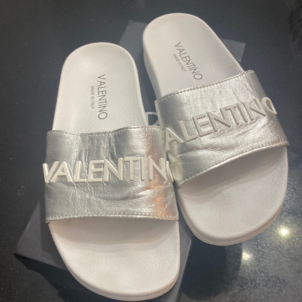Valentino slides.  Size 8 - silver with white writing. Excellent condition